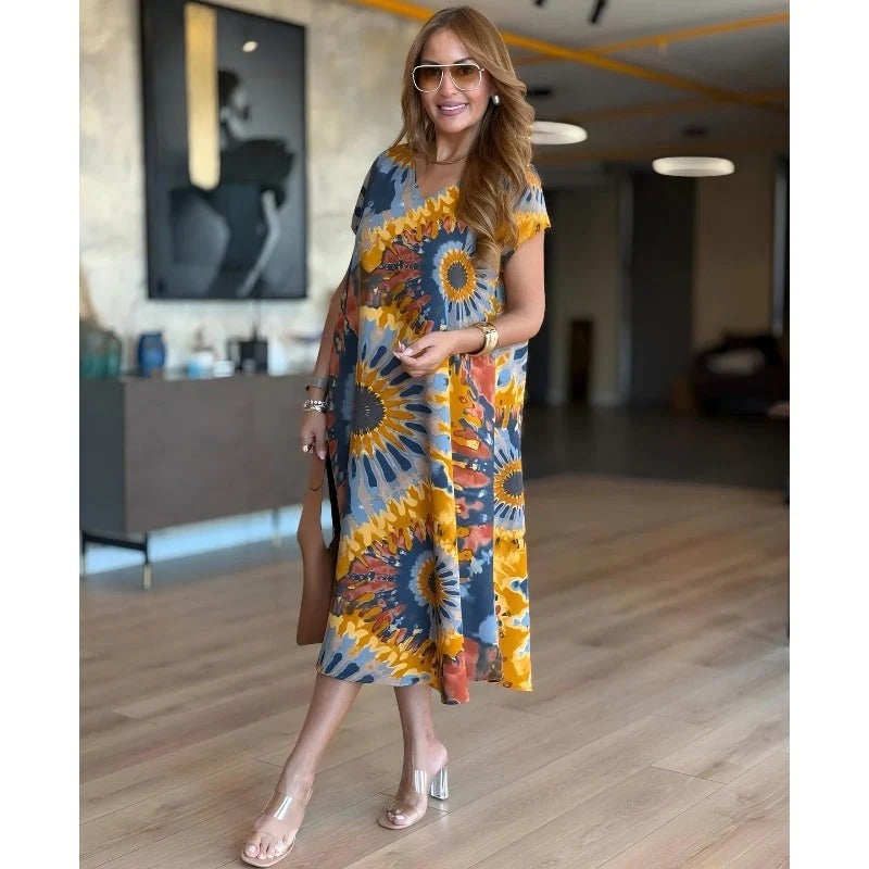 CALYPSA / VESTIDO LARGO ESTAMPADO CON ESCOTE EN V Y CORTE RELAJADO